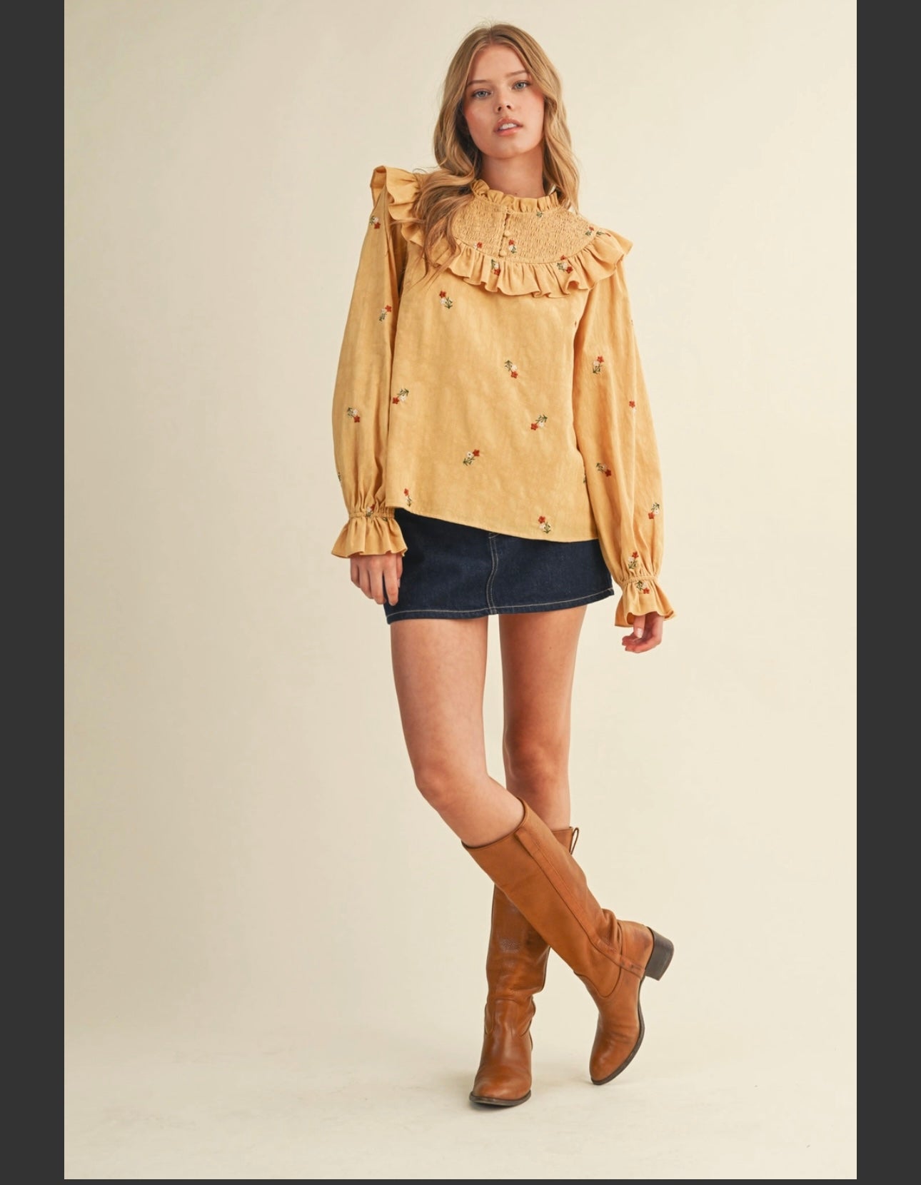 Smocked neck embroidered top