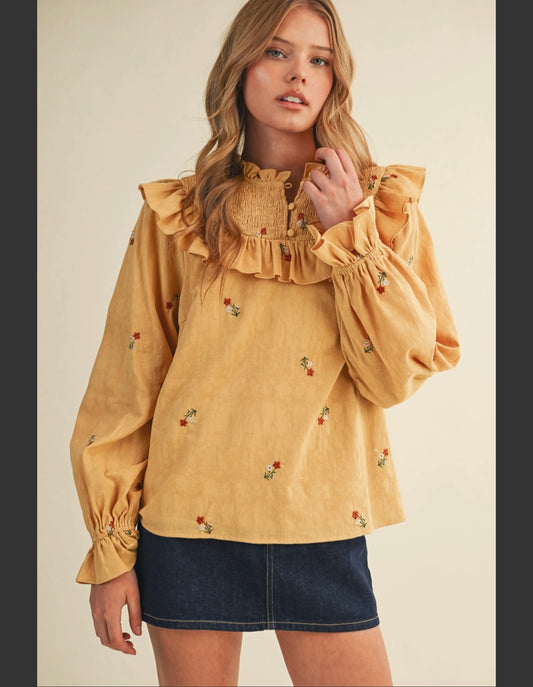 Smocked neck embroidered top